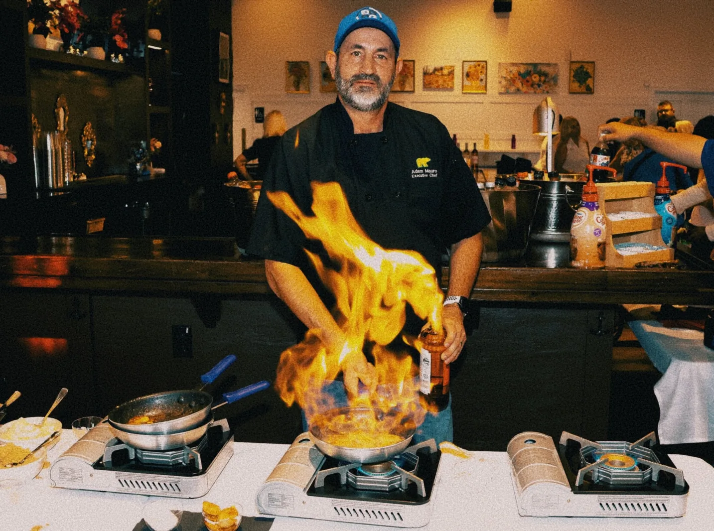 Chef Adam Mauro fire it up during the grand opening of The Venue Clermont